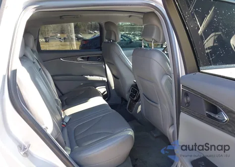 2019 Lincoln Nautilus Reserve z USA, uszkodzony, nr VIN 2LMPJ6L93KBL31472